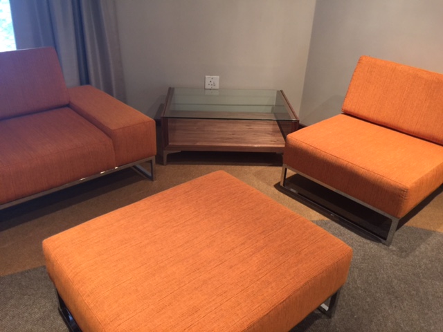 Office lounge area with fabric sofas