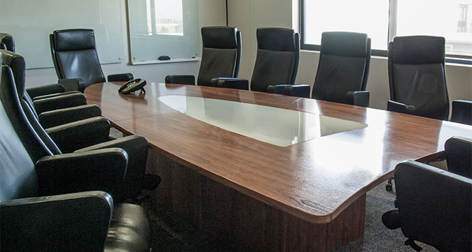Boardroom with black leather chairs